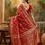 red banarasi jacquard saree with intricate zari weaving, mina & lace work on pallu