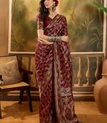 maroon banarasi jacquard saree with rich zari weaving, mina & lace work on pallu