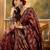 maroon banarasi jacquard saree with rich zari weaving, mina & lace work on pallu