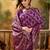 purple banarasi jacquard saree with rich zari weaving & tassel pallu     unstitched blouse included