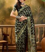 black banarasi jacquard saree with rich zari weaving & tassel pallu     includes unstitched blouse