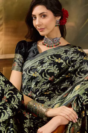 black banarasi jacquard saree with rich zari weaving & tassel pallu     includes unstitched blouse