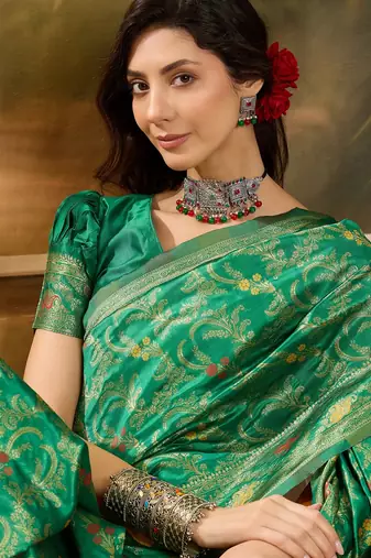 green banarasi jacquard saree with elegant zari weaving & tassel pallu     includes unstitched blouse