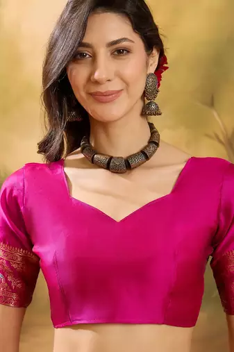 pink banarasi jacquard saree with rich zari weaving & tassel pallu     includes unstitched blouse