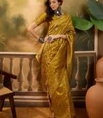 mustard banarasi jacquard saree with rich zari weaving & tassel pallu     unstitched blouse included