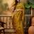 mustard banarasi jacquard saree with rich zari weaving & tassel pallu     unstitched blouse included