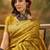 mustard banarasi jacquard saree with rich zari weaving & tassel pallu     unstitched blouse included