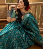 teal blue banarasi jacquard saree with zari weaving & tassel pallu     unstitched blouse material included