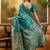 teal blue banarasi jacquard saree with zari weaving & tassel pallu – unstitched blouse material included