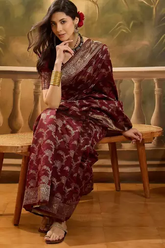 maroon banarasi jacquard saree with zari weaving & tassel pallu     unstitched blouse material