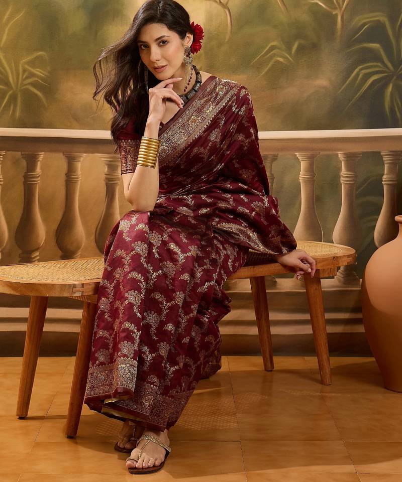 maroon banarasi jacquard saree with zari weaving & tassel pallu – unstitched blouse material