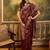maroon banarasi jacquard saree with zari weaving & tassel pallu – unstitched blouse material