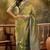 elegant green banarasi jacquard saree with rich zari weaving & tassel pallu     unstitched blouse
