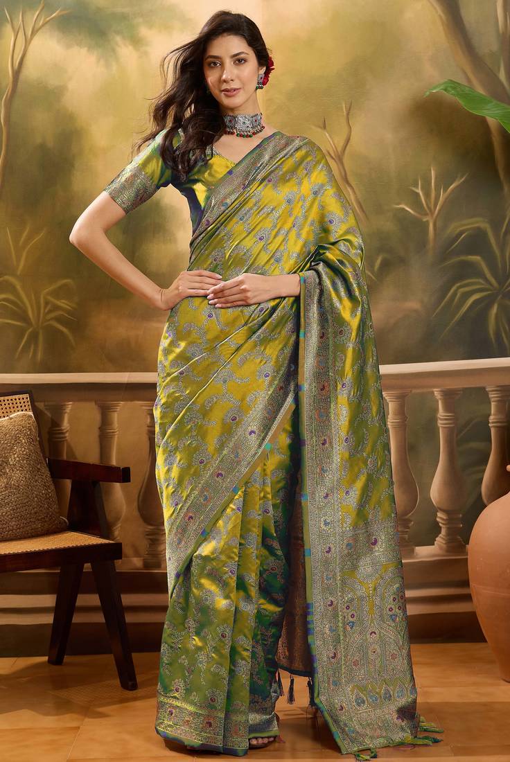 elegant green banarasi jacquard saree with rich zari weaving & tassel pallu     unstitched blouse