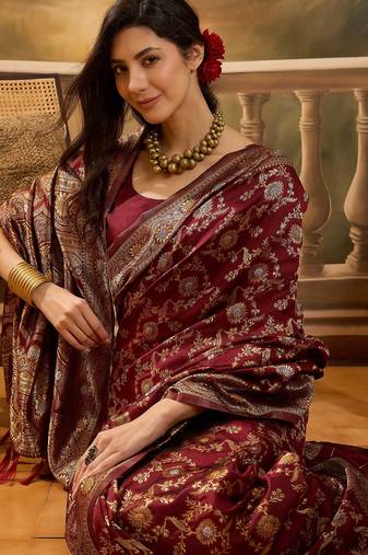 regal maroon banarasi jacquard saree with zari weaving & tassel pallu     unstitched blouse