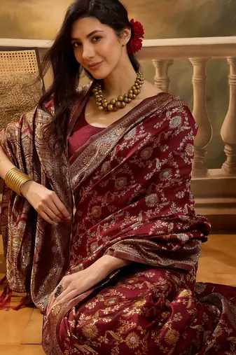 regal maroon banarasi jacquard saree with zari weaving & tassel pallu     unstitched blouse