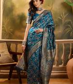 teal blue banarasi jacquard saree with golden zari weaving & tassel pallu     unstitched blouse