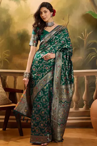 green banarasi jacquard saree with golden zari weaving & tassel pallu     unstitched blouse