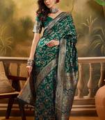 green banarasi jacquard saree with golden zari weaving & tassel pallu     unstitched blouse