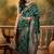 green banarasi jacquard saree with golden zari weaving & tassel pallu     unstitched blouse