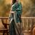 green banarasi jacquard saree with golden zari weaving & tassel pallu     unstitched blouse
