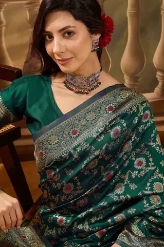 green banarasi jacquard saree with golden zari weaving & tassel pallu     unstitched blouse
