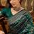 green banarasi jacquard saree with golden zari weaving & tassel pallu     unstitched blouse