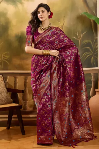 wine banarasi jacquard saree with golden zari weaving & tassel pallu     unstitched blouse