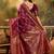 wine banarasi jacquard saree with golden zari weaving & tassel pallu – unstitched blouse