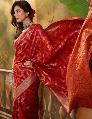 red banarasi jacquard saree with golden zari weaving & tassel pallu     unstitched blouse 1