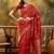 red banarasi jacquard saree with golden zari weaving & tassel pallu     unstitched blouse