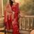 red banarasi jacquard saree with golden zari weaving & tassel pallu     unstitched blouse