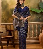 navy blue banarasi jacquard saree with golden zari weaving & tassel pallu     unstitched blouse