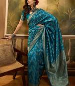 teal blue banarasi jacquard saree with golden zari weaving & tassel pallu     unstitched blouse