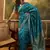teal blue banarasi jacquard saree with golden zari weaving & tassel pallu     unstitched blouse