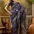 navy blue banarasi jacquard saree with golden zari weaving & tassel pallu     unstitched blouse