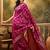 magenta banarasi jacquard saree with golden zari weaving & tassel pallu     unstitched blouse