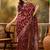 maroon banarasi jacquard saree with rich golden zari weaving & tassel pallu     unstitched blouse