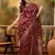 maroon banarasi jacquard saree with rich golden zari weaving & tassel pallu     unstitched blouse