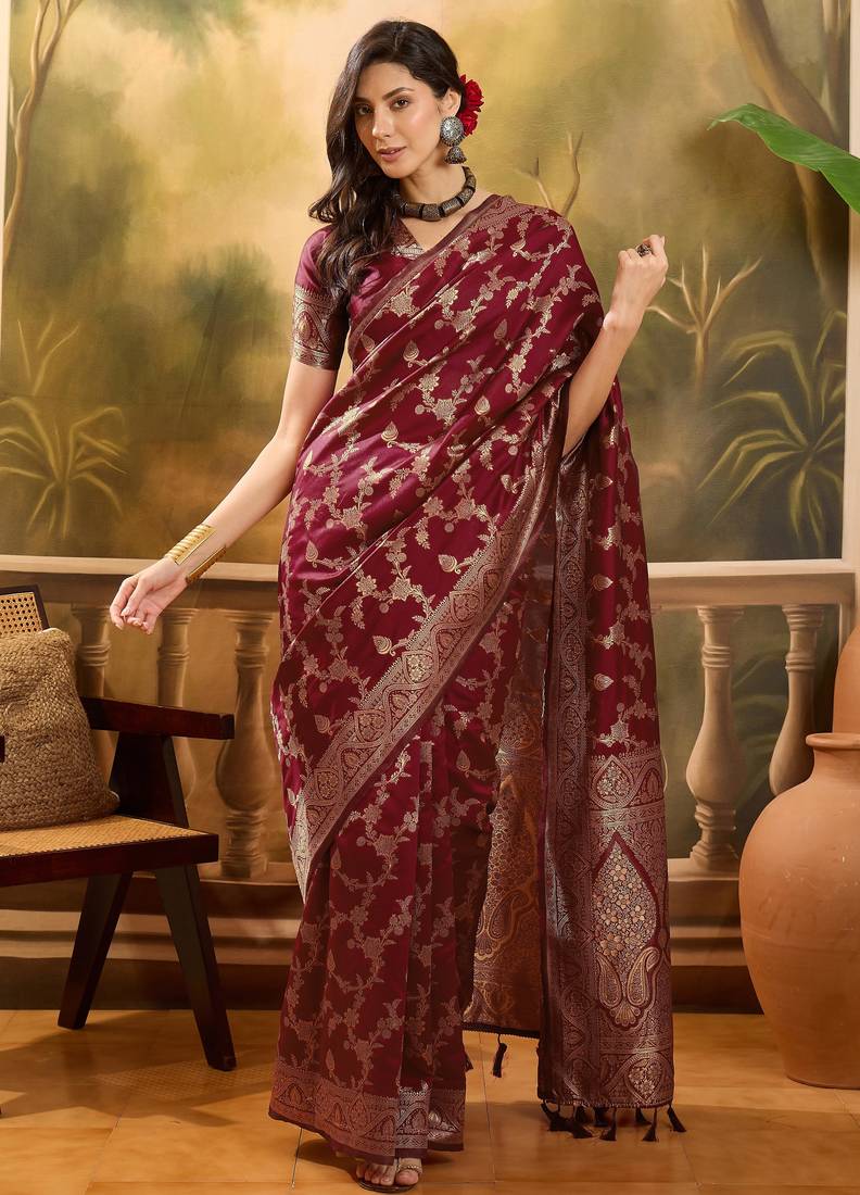 maroon banarasi jacquard saree with rich golden zari weaving & tassel pallu     unstitched blouse