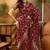 maroon banarasi jacquard saree with rich golden zari weaving & tassel pallu     unstitched blouse