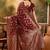 maroon banarasi jacquard saree with rich golden zari weaving & tassel pallu     unstitched blouse