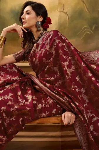 maroon banarasi jacquard saree with rich golden zari weaving & tassel pallu     unstitched blouse