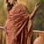 copper rose banarasi jacquard saree with intricate zari weaving & tassel pallu     unstitched blouse