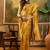 golden banarasi jacquard saree with rich zari weaving & tassel pallu     unstitched blouse