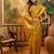 golden banarasi jacquard saree with rich zari weaving & tassel pallu     unstitched blouse