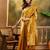 golden banarasi jacquard saree with rich zari weaving & tassel pallu     unstitched blouse
