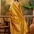 golden banarasi jacquard saree with rich zari weaving & tassel pallu     unstitched blouse