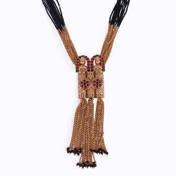 gold tone temple style long mangalsutra set with flower motifs 2
