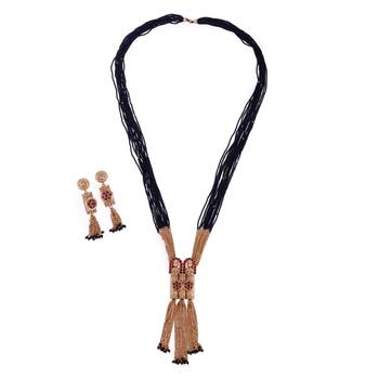 gold tone temple style long mangalsutra set with flower motifs 3